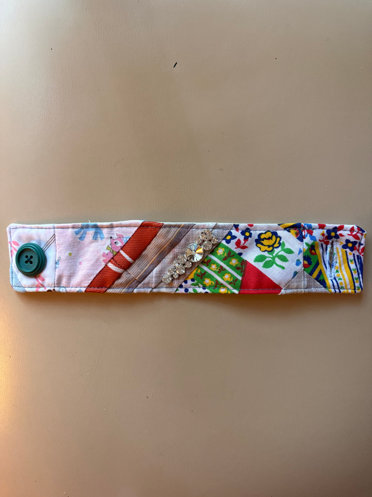 Unique Quilted Bracelet with Rhinestone Adornment
